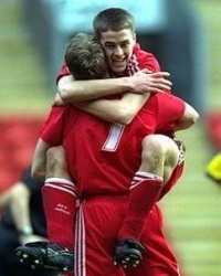 Michael Owen bonding with a colleague