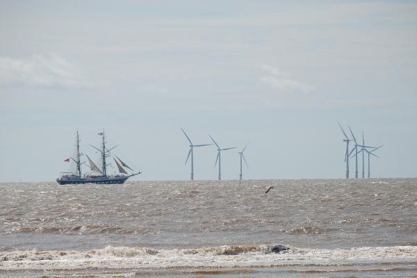 Stavros S Niarchos by the windfarm