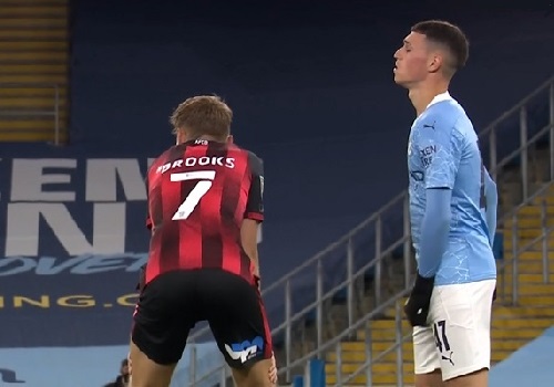 Phil Foden caught sizing up David Brooks' arse