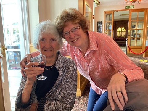 Linda and mum raise a glass to life