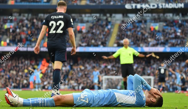 Phil Foden flat out on his back