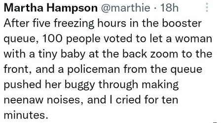 Queue helps woman with young child