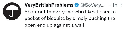 Push the open end of the packet of biscuits against a wall